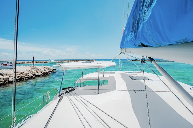 5-Hour 38'Luxury Catamaran All-Inclusive Tulum & Playa del Carmen - Stop 2 at La Bocana: shallow water, clear sightlines, and music