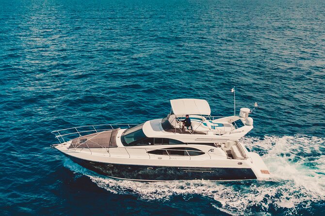 8-Hour Private 50' Azimut 2-Stop Tour to Cozumel Beach w/Food, Drinks & Snorkel - Riviera Maya waters: Playa Palancar, palapas, and a lunch with real personality