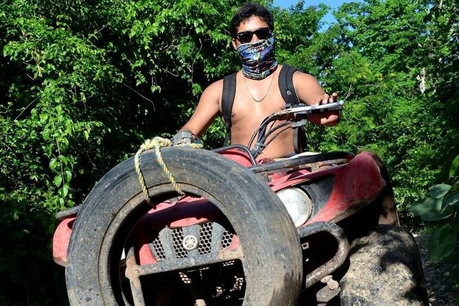 Adventure in ATV, Cenote swimming, snack & transportation - Stop in Akumal: ATV riding on dirt trails to cenotes