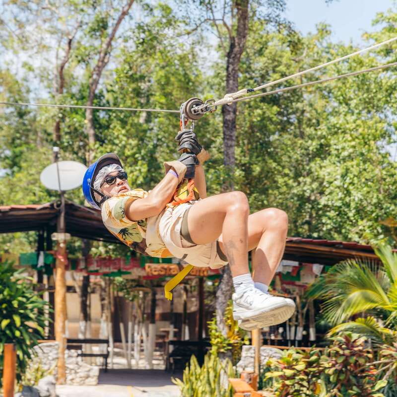 Air & Water Tour - Treetop Zipline: 7 Lines, Hanging Bridges, and a Spider Web