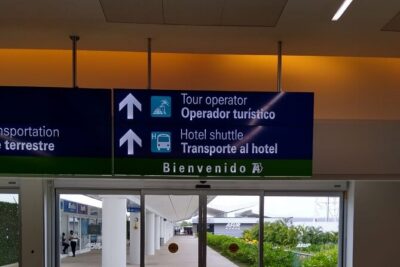 Airport Transfers to Puerto Aventuras - Private van (ROUND TRIP) FLAT RATE - Finding Your Driver at the Terminal: Banner Sign and Flight Tracking