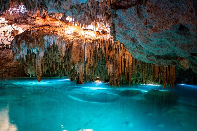 Akumal Cenote Swimming and Snorkeling from Cancun & Costa Mujeres - Stop 1: Akumal cenote swim with stalactites and stalagmites