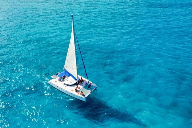 Catamaran Tour to Isla Mujeres Snorkeling with Buffet and Open Bar - Pickup and Timing: The 8:00 am start and how not to miss it