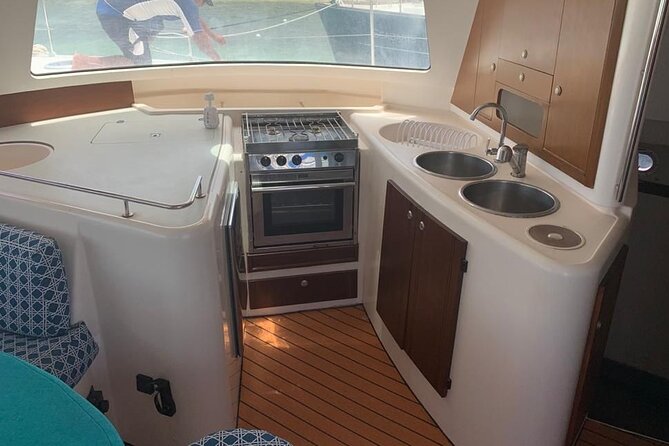 Catamaran Tour to Isla Mujeres Snorkeling with Buffet and Open Bar - Group Size and Pacing: 8 to 9 hours, max 40 people
