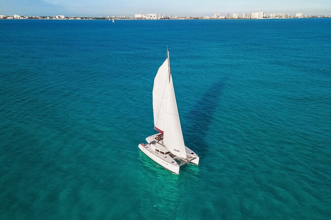 Isla Mujeres All Inclusive Sailboat Experience - Breakfast, lunch, and the IXI Beach open bar stretch