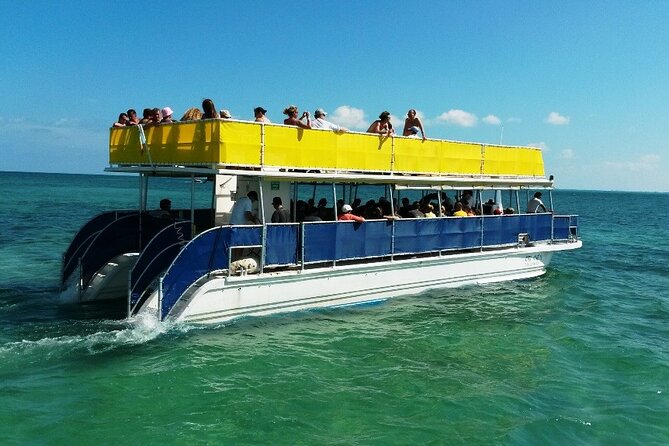 Isla Mujeres Catamaran Unlimited! Transportation from Playa del Carmen - The catamaran experience: open bar, food, and a real onboard vibe