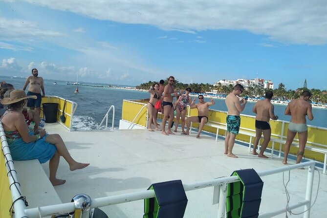 Isla Mujeres Catamaran Unlimited! Transportation from Playa del Carmen - Arrival at Isla Mujeres: beach club access with loungers and facilities