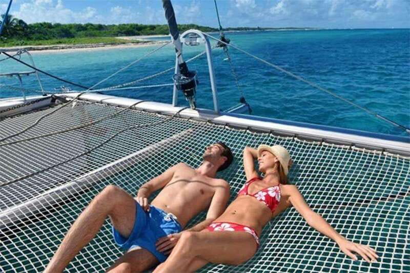 Isla Mujeres Plus Experience Catamaran Tour + Snorkel+Lunch - Catamaran Comfort, Open Bar, and Lunch Onboard