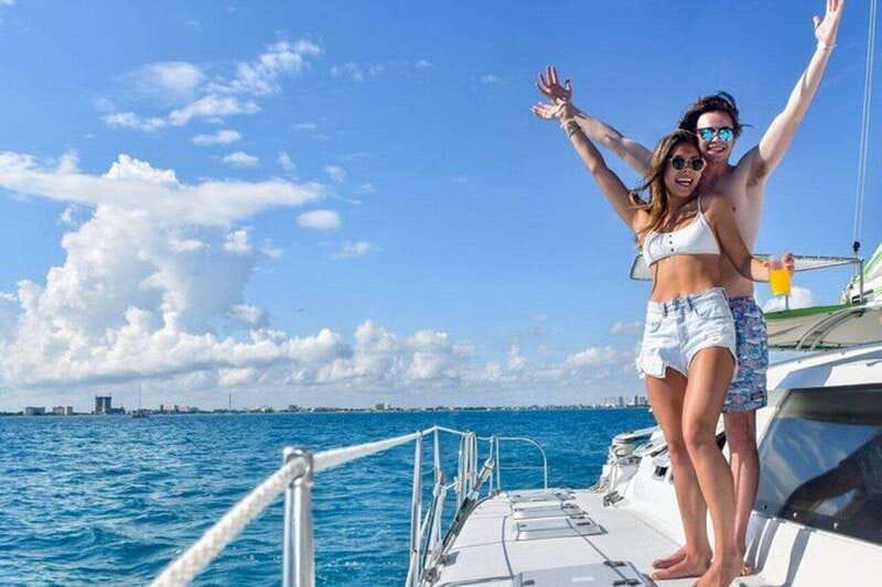 Isla Mujeres Plus Experience Catamaran Tour + Snorkel+Lunch - Weather-Dependent Sailing Fun: Spinnaker Time If Conditions Let You