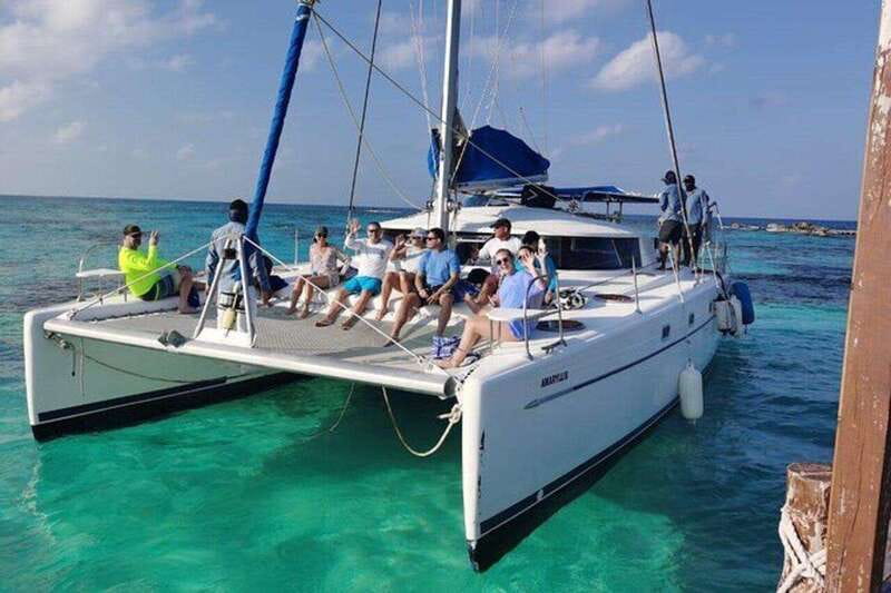 Isla Mujeres Plus Experience Catamaran Tour + Snorkel+Lunch - Isla Mujeres Free Time: Playa Norte and the Reality of a Popular Island