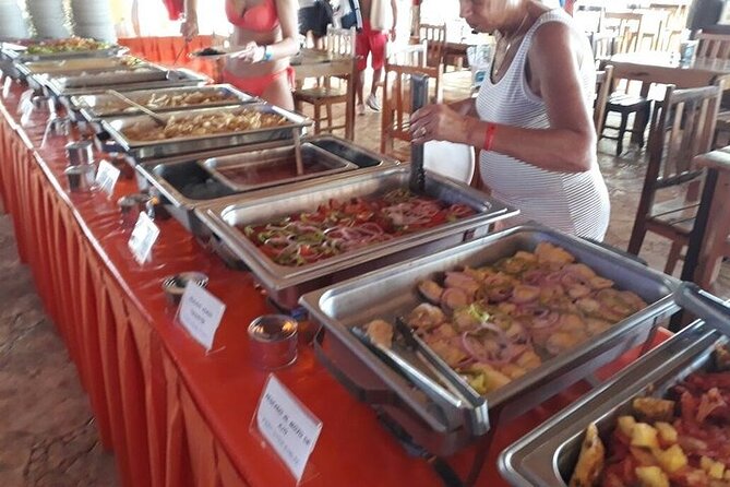 Isla Mujeres Unlimited Catamaran! Drinks, Fun & Party From Playa Del Carmen - Isla Mujeres Time With a Beach Club Setup: Loungers, Buffetted Meals, and Free Wandering