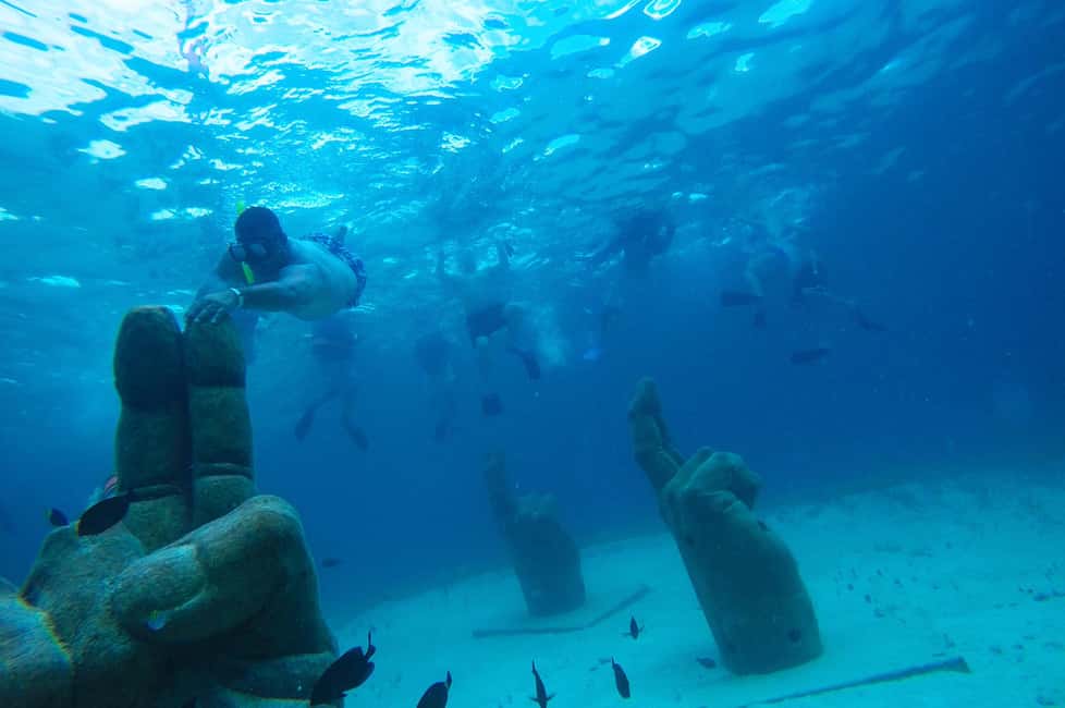 PDC: Isla Mujeres Catamaran Tour with Snorkeling - Downtown Isla Mujeres: 90 minutes for souvenirs and local color