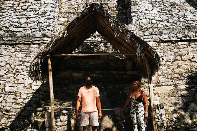 Private Full-Day Guided Tulum Coba and Cenote Tour with Lunch - Stop 2 at Coba: rainforest walk, birds overhead, and big Maya scale