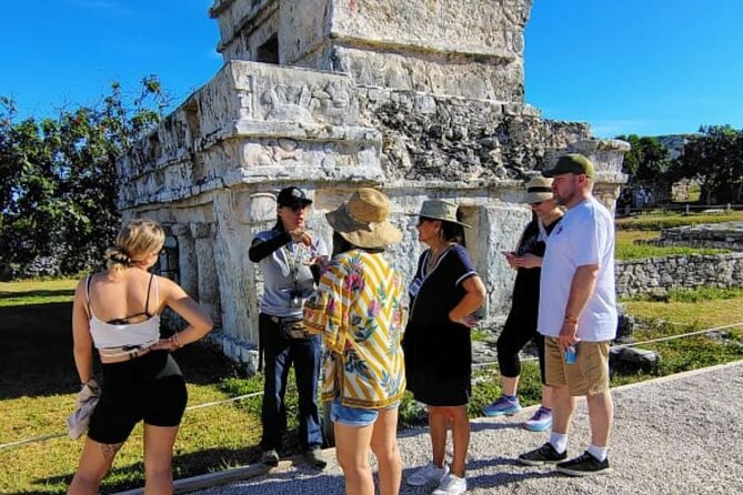 Riviera Maya : Tulum Ruins Tour, 3 Cenotes, Mexican Lunch - Tulum Ruins: sea views with a guide doing the heavy lifting